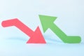 Red downward arrow and green upward arrow. Bearish versus Bullish market clash in stocks and cryptocurrency trading concept. Royalty Free Stock Photo