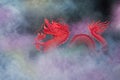 Red dragon in beautiful colored smoke Royalty Free Stock Photo