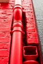 Red drainpipe Royalty Free Stock Photo