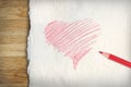 Red drawn heart on old paper Royalty Free Stock Photo