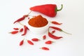 Red dried crushed hot chili peppers and chili flakes or powder isolated on white background, healthy turkish spice Royalty Free Stock Photo