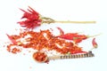 Red dried crushed hot chili peppers and chili flakes or powder isolated on white background, healthy turkish spice Royalty Free Stock Photo