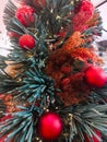 Red dried flowers and red balls are used to decorate the Christmas tree to celebrate Merry Christmas and Happy New Year. Royalty Free Stock Photo