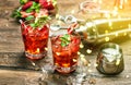 Red drink Aperitif mojito caipirinha juice Vintage style bokeh Royalty Free Stock Photo