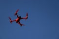 Red drone on a blue background Royalty Free Stock Photo