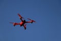 Red drone on a blue background Royalty Free Stock Photo