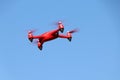 Red drone on a blue background Royalty Free Stock Photo