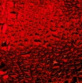 red drops of water on the glass Royalty Free Stock Photo