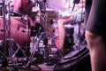 Red drums on stage. Drummer feet Royalty Free Stock Photo