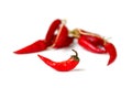 Red dry chili pepper in front of bunch of other peppers on white background Royalty Free Stock Photo