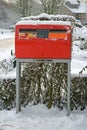 Red Dutch mailbox in the snow Royalty Free Stock Photo