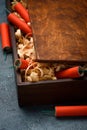 Red dynamite tnt firecrackers in wooden box