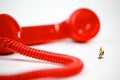 Red earphone on call with the office boy Royalty Free Stock Photo