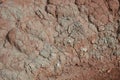 Red earth with furrows after rainwater Royalty Free Stock Photo