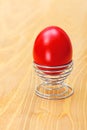 Red Easter egg in metallic spiral cup Royalty Free Stock Photo