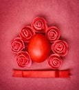 Red easter egg on paper textural background Royalty Free Stock Photo