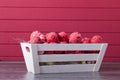 Red Easter eggs in a wooden container Royalty Free Stock Photo
