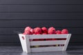 Red Easter eggs in a wooden container Royalty Free Stock Photo