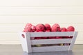 Red Easter eggs in a wooden container Royalty Free Stock Photo