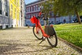 Red electric bike on the sunny street