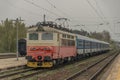 Red electric engine in Brno Kralovo Pole station in spring cold day