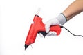 Red electric glue gun. On a white isolated background.