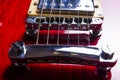 Red electric guitar close-up. Guitar in the style of Les Paul macro Royalty Free Stock Photo