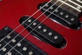 Red electric guitar close up. The sound was filmed on an electric guitar. Royalty Free Stock Photo