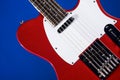 Red Electric Guitar On Green Royalty Free Stock Photo