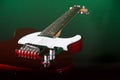 Red Electric Guitar On Green Royalty Free Stock Photo