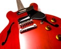 Red electric guitar upright Royalty Free Stock Photo