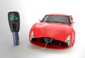 Red electric sports car charging at EV charging station