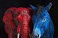 A red elephant and blue donkey symbol of Republican and Democrat political party Royalty Free Stock Photo