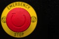 Red emergency button on black panel. Stop Royalty Free Stock Photo