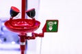 Red emergency eye washing station equipment with safety signage Royalty Free Stock Photo