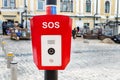 Red emergency police SOS call button alarm box with light bar, cctv camera and speaker device for urgent comunication on Royalty Free Stock Photo