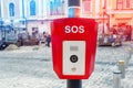 Red emergency police SOS call button alarm box with light bar, cctv camera and speaker device for urgent comunication on Royalty Free Stock Photo