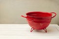 Red empty colander