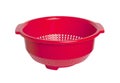 Red empty colander isolated