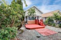 Red empty walkout deck at the back yard