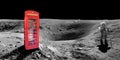 Red english london phone booth on the surface of the moon Royalty Free Stock Photo