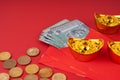 Red envelope angpow with 50 Ringgit Malaysia, gold coins and ingot Royalty Free Stock Photo
