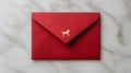 Red envelope with gold horse emblem on marble surface, minimalistic and elegant composition Royalty Free Stock Photo