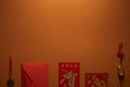 Red envelope, golden chinese decorations and hieroglyphs