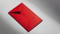 Red envelope on gray background with soft shadows and daylight Royalty Free Stock Photo