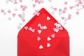 Red envelope and many hearts isolated. Valentine day greeting concept Royalty Free Stock Photo