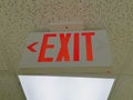 Red exit sign on ceiling Royalty Free Stock Photo