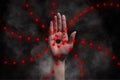 Red eye on hand occultism background concept