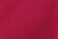 Red fabric background texture. Detail of textile material close-up Royalty Free Stock Photo