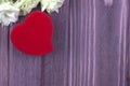 Red fabric Heart with flowers on the dark wooden background. Valentine Day. Wedding. Greeting card. Royalty Free Stock Photo